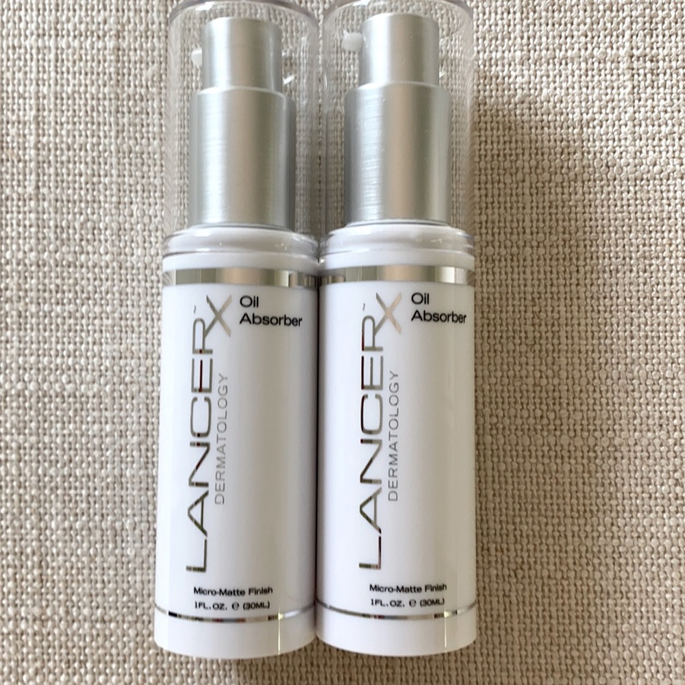 Lancer Dermatology 2 bottles of oil absorber.